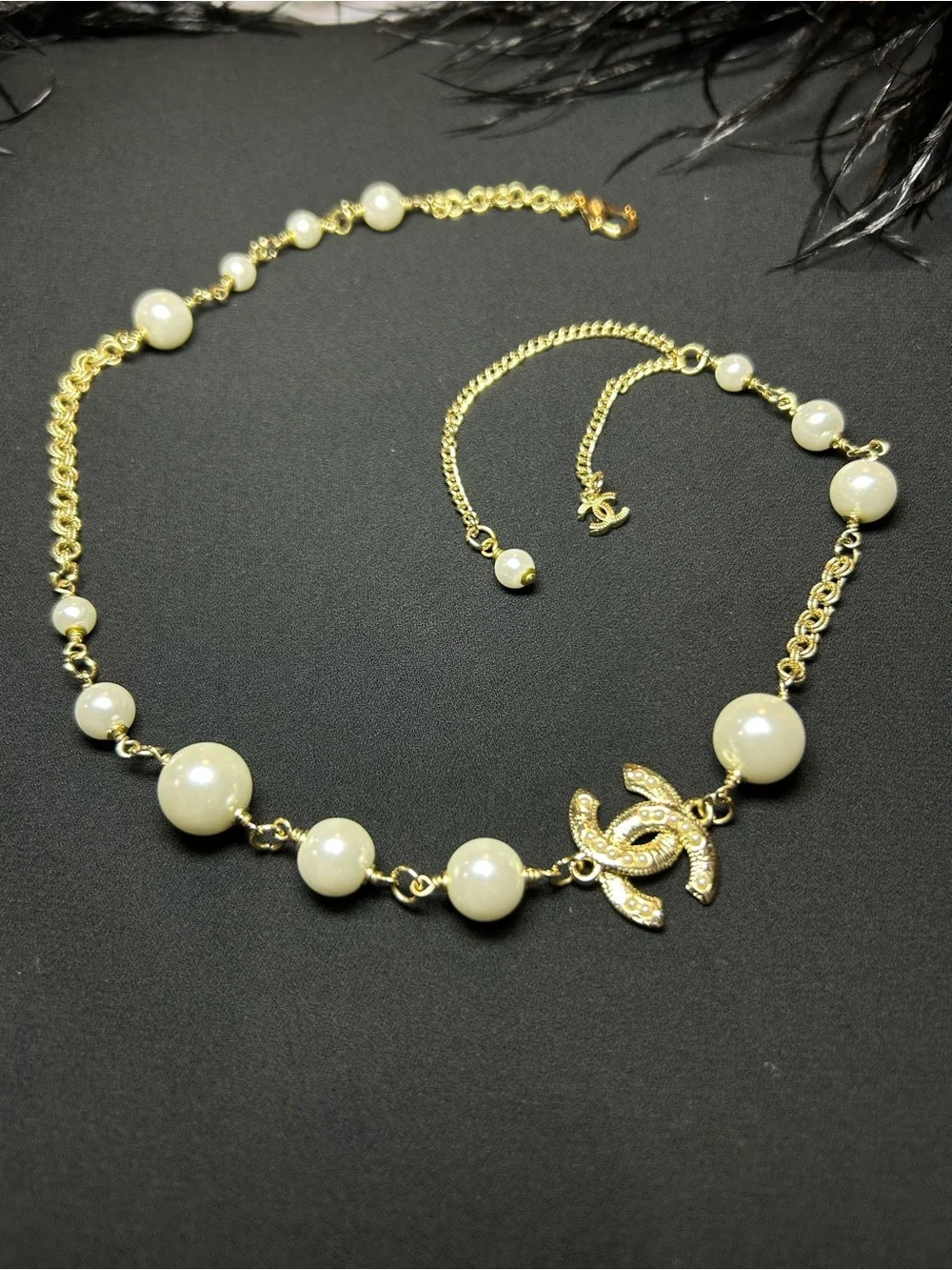 CHANEL Gold-Tone Pearl Necklace with Crystal CC Emblem
